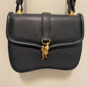 Elegant Black Shoulder Bag with Gold Accents